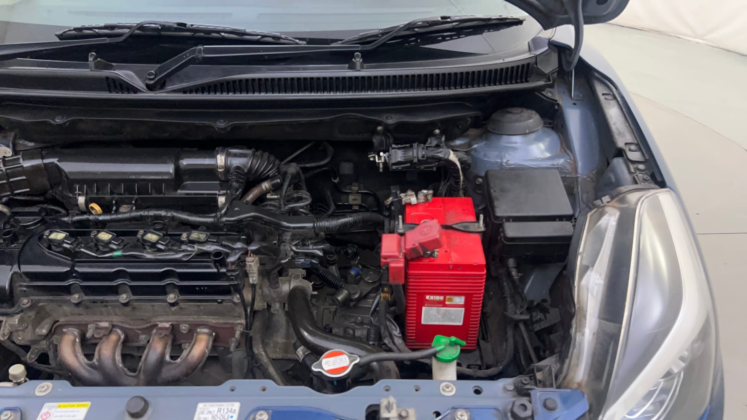 Used 2018 Maruti Suzuki Baleno Alpha 1.2 Petrol Manual engine ENGINE LEFT SIDE HINGE & APRON VIEW