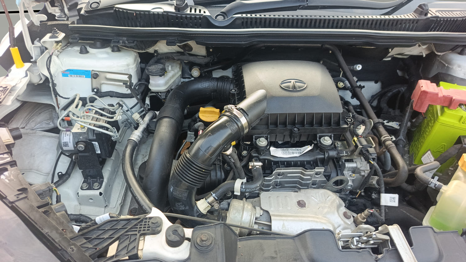 Used 2024 Tata Nexon Fearless Plus S 1.2 Revotron Petrol 7DCA DT Petrol Automatic engine ENGINE RIGHT SIDE VIEW