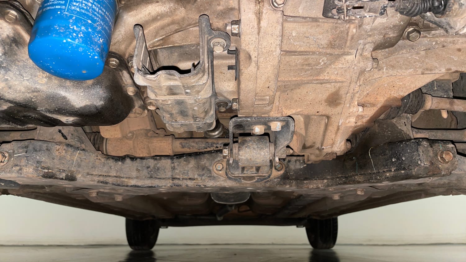 Used 2014 Hyundai Grand i10 Sportz 1.2 Kappa VTVT Petrol Manual extra FRONT LEFT UNDERBODY VIEW