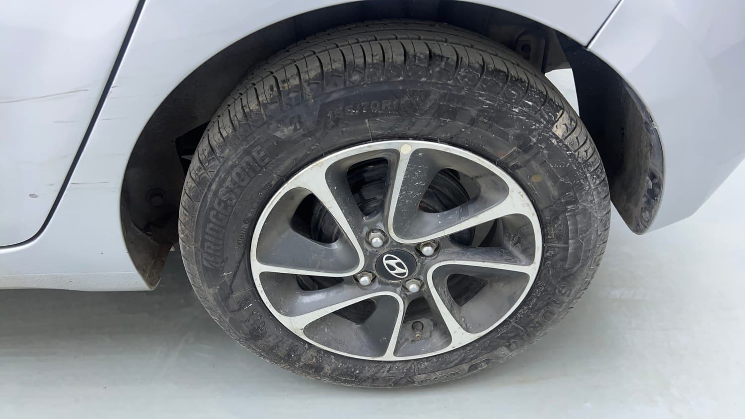 Used 2018 Hyundai Grand i10 Sportz AT 1.2 Kappa VTVT Petrol Automatic tyres LEFT REAR TYRE RIM VIEW