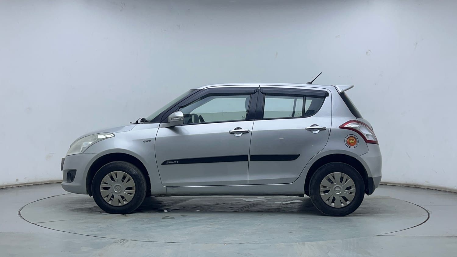 Used 2013 Maruti Suzuki Swift VXi Petrol Manual exterior LEFT SIDE VIEW