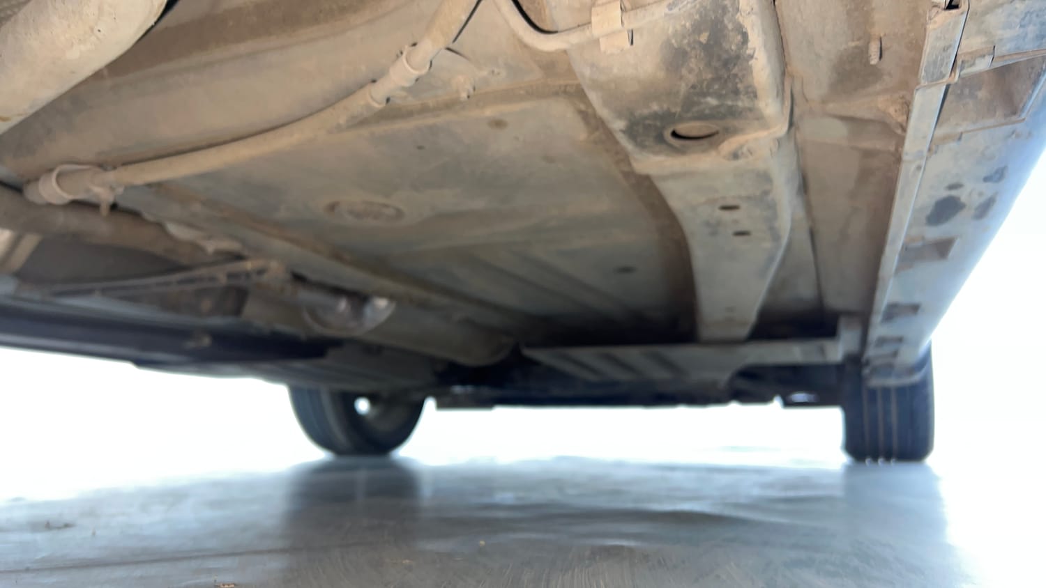Used 2024 Toyota Glanza G AMT Petrol Automatic extra REAR RIGHT UNDERBODY VIEW