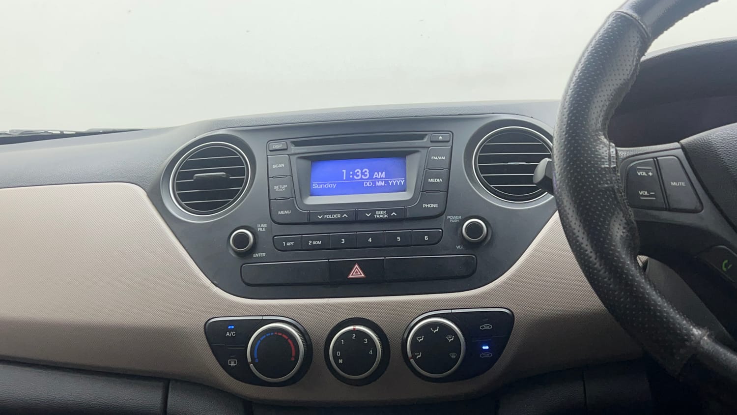 Used 2014 Hyundai Xcent S 1.2 Petrol Manual interior MUSIC SYSTEM & AC CONTROL VIEW