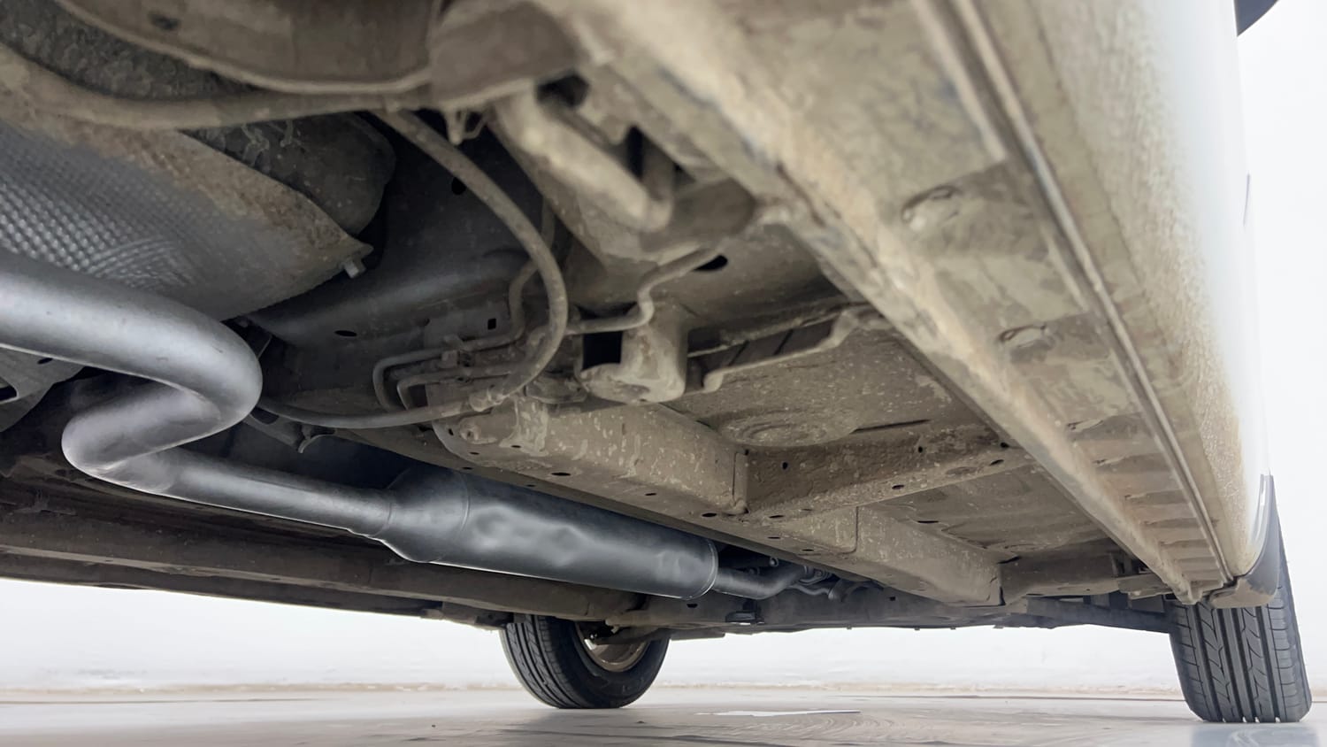Used 2012 Maruti Suzuki Swift Dzire ZXI Petrol Manual extra REAR RIGHT UNDERBODY VIEW