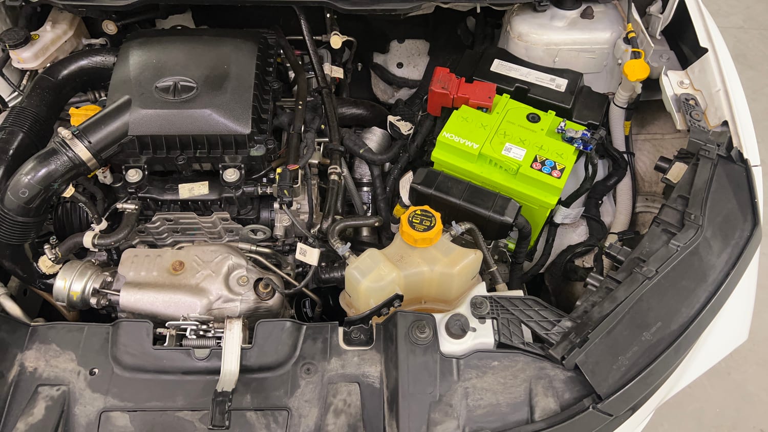 Used 2023 Tata Nexon Creative Plus S 1.2 Revotron Petrol 6AMT Petrol Automatic engine ENGINE LEFT SIDE VIEW