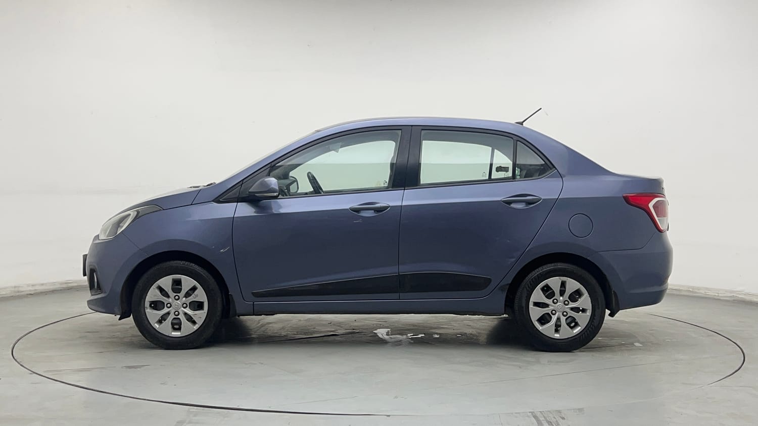 Used 2014 Hyundai Xcent S 1.2 Petrol Manual exterior LEFT SIDE VIEW