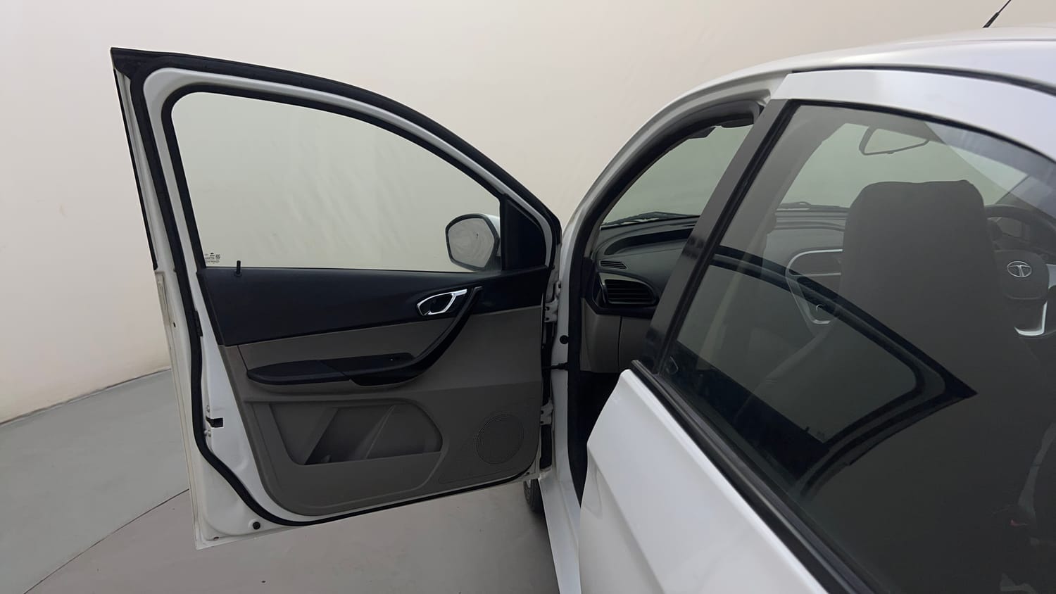 Used 2016 Tata Tiago Revotron XT Petrol Manual interior LEFT FRONT DOOR OPEN VIEW