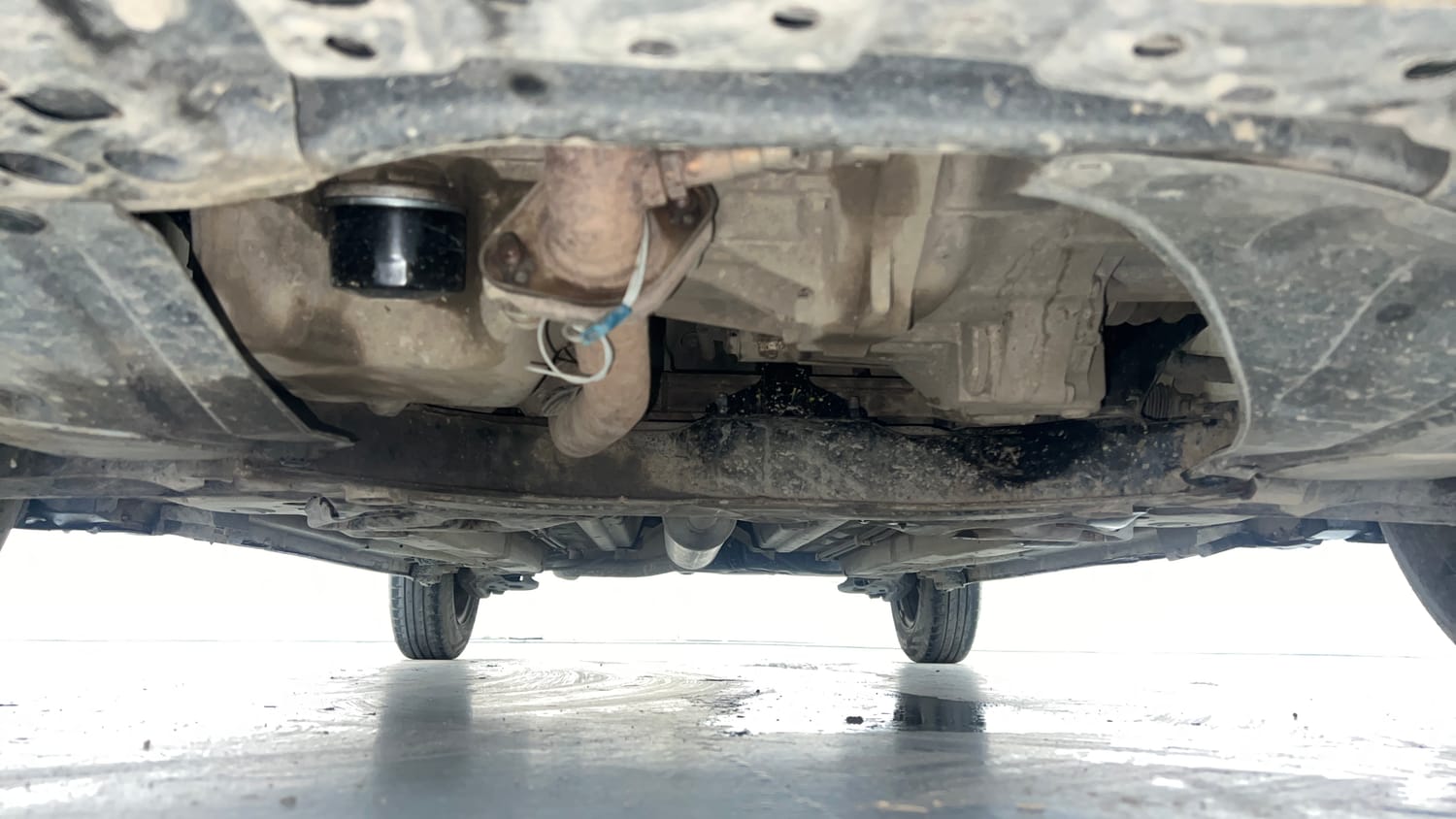 Used 2013 Maruti Suzuki Swift VXi Petrol Manual extra FRONT LEFT UNDERBODY VIEW