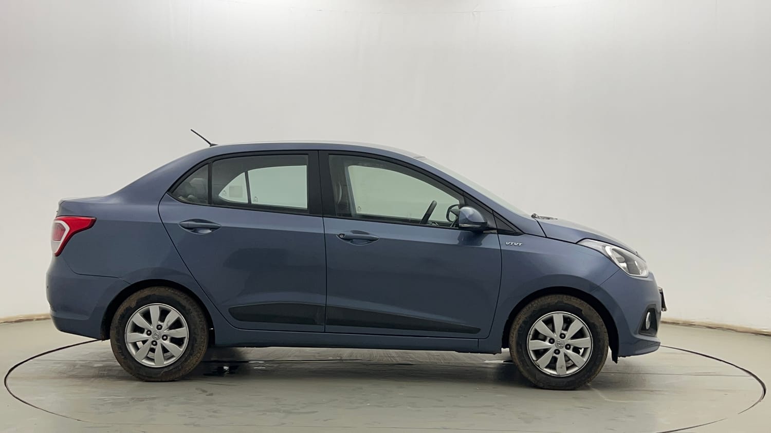 Used 2016 Hyundai Xcent SX 1.2 Petrol Manual exterior RIGHT SIDE VIEW