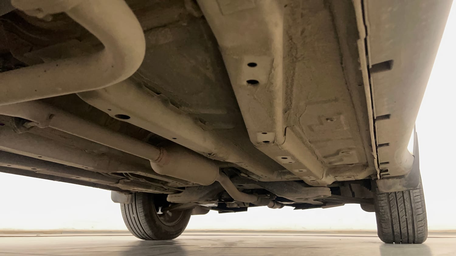Used 2023 Tata Nexon Creative Plus S 1.2 Revotron Petrol 6AMT Petrol Automatic extra REAR RIGHT UNDERBODY VIEW