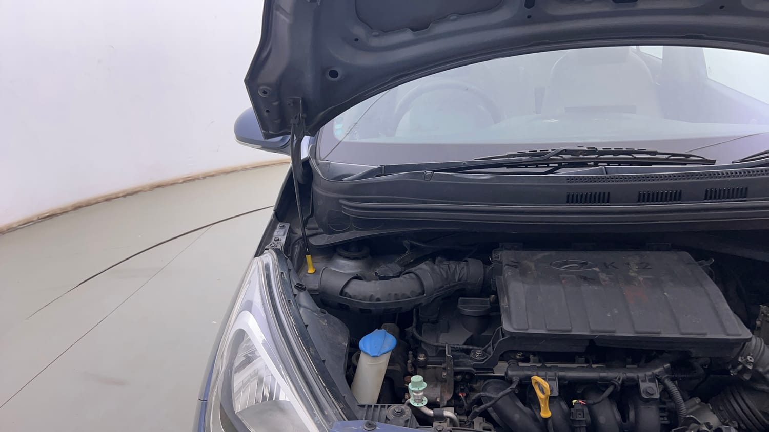 Used 2016 Hyundai Xcent SX 1.2 Petrol Manual engine ENGINE RIGHT SIDE HINGE & APRON VIEW