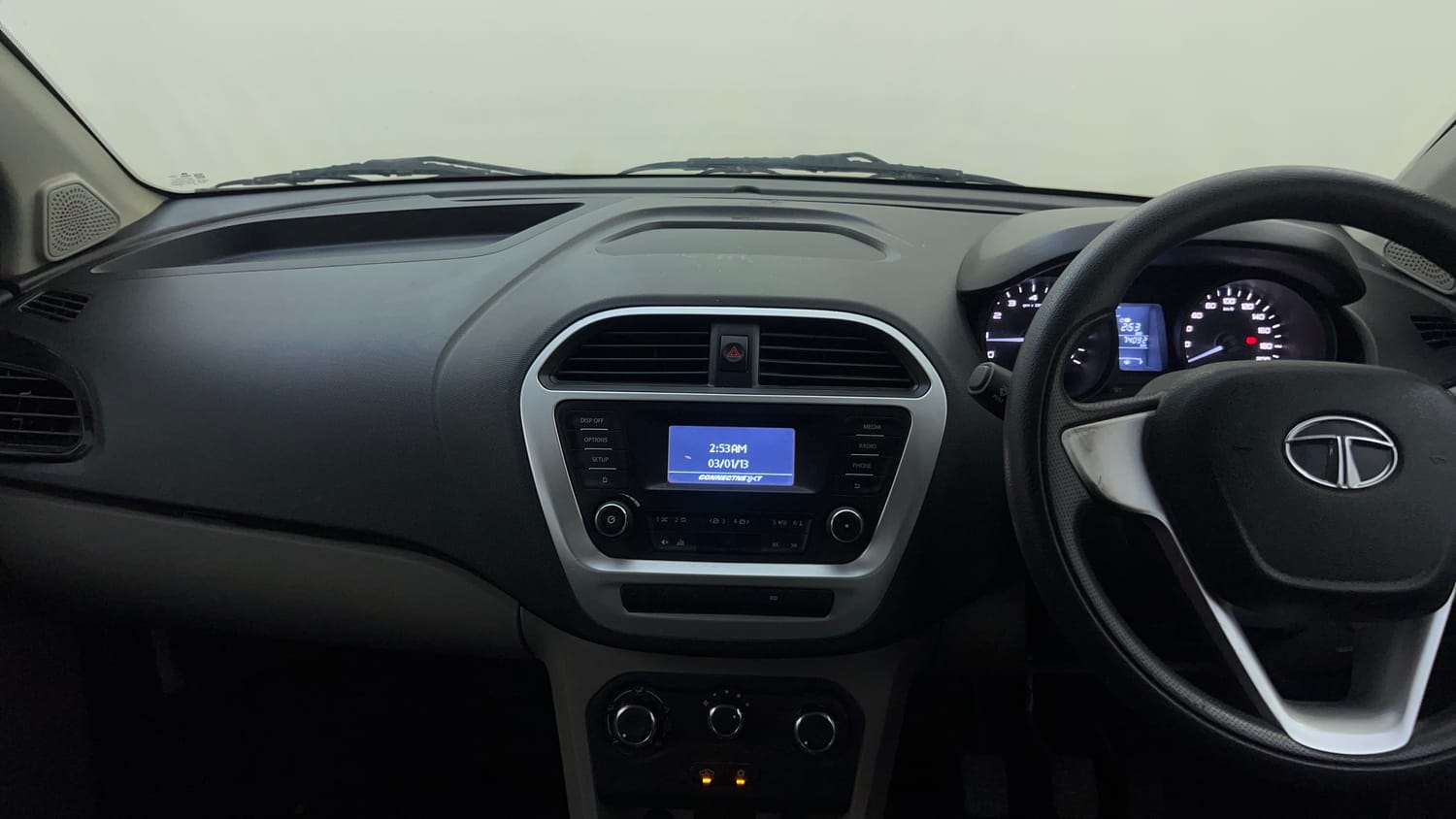 Used 2016 Tata Tiago Revotron XT Petrol Manual interior MUSIC SYSTEM & AC CONTROL VIEW