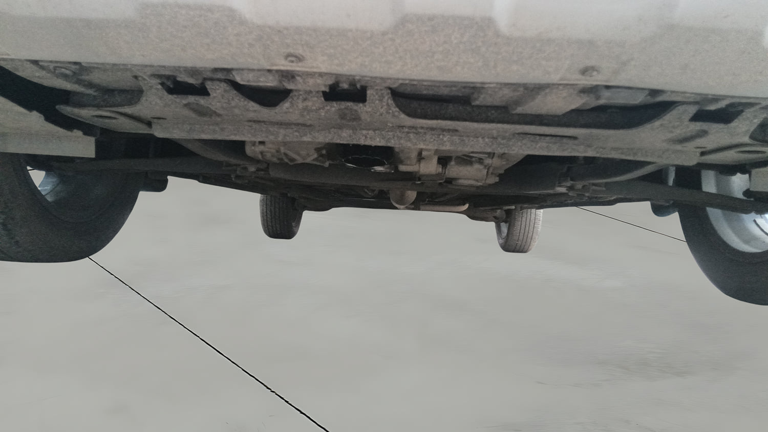 Used 2023 Nissan Magnite XV AMT Petrol Automatic extra FRONT LEFT UNDERBODY VIEW