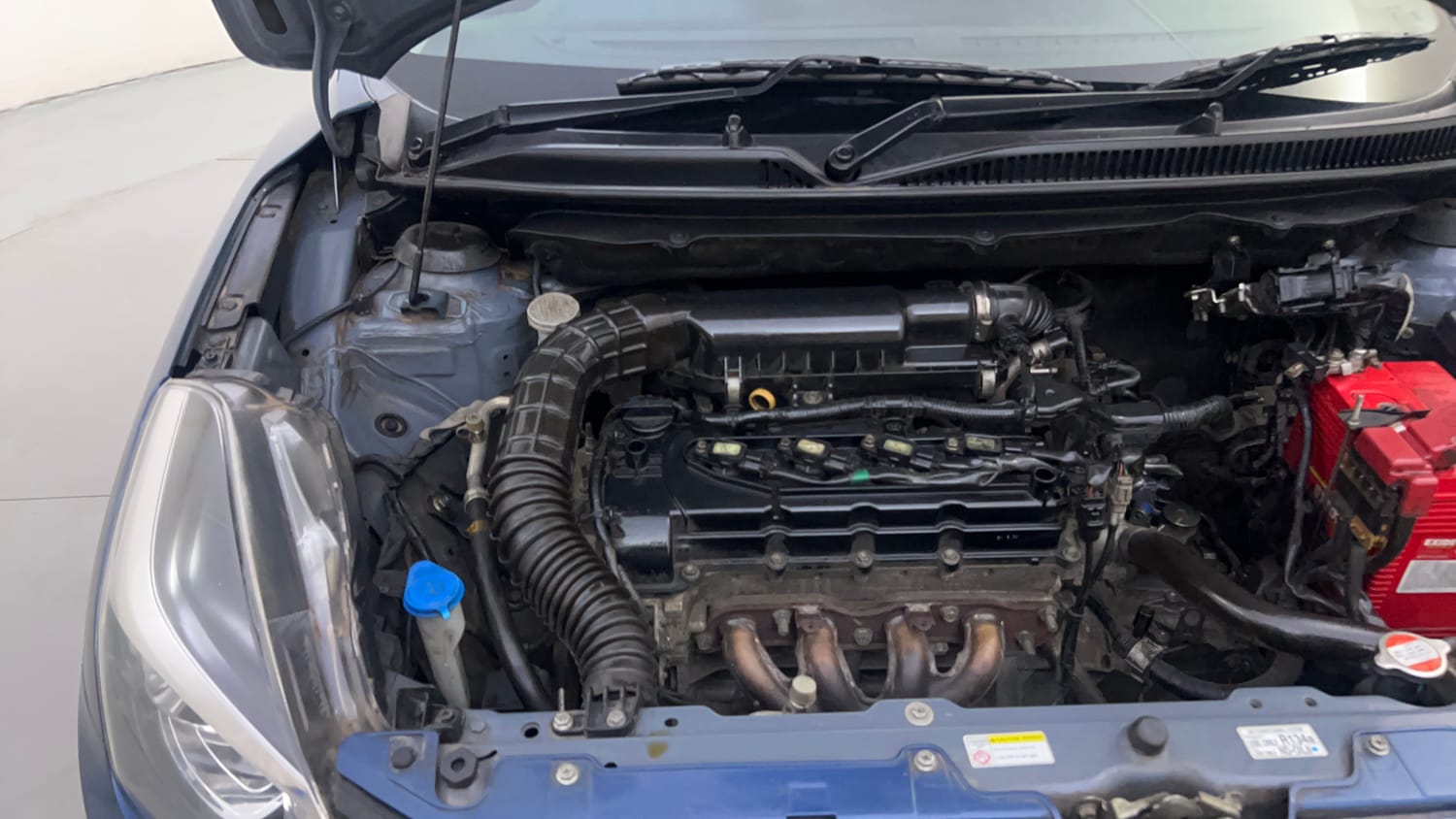 Used 2018 Maruti Suzuki Baleno Alpha 1.2 Petrol Manual engine ENGINE RIGHT SIDE HINGE & APRON VIEW