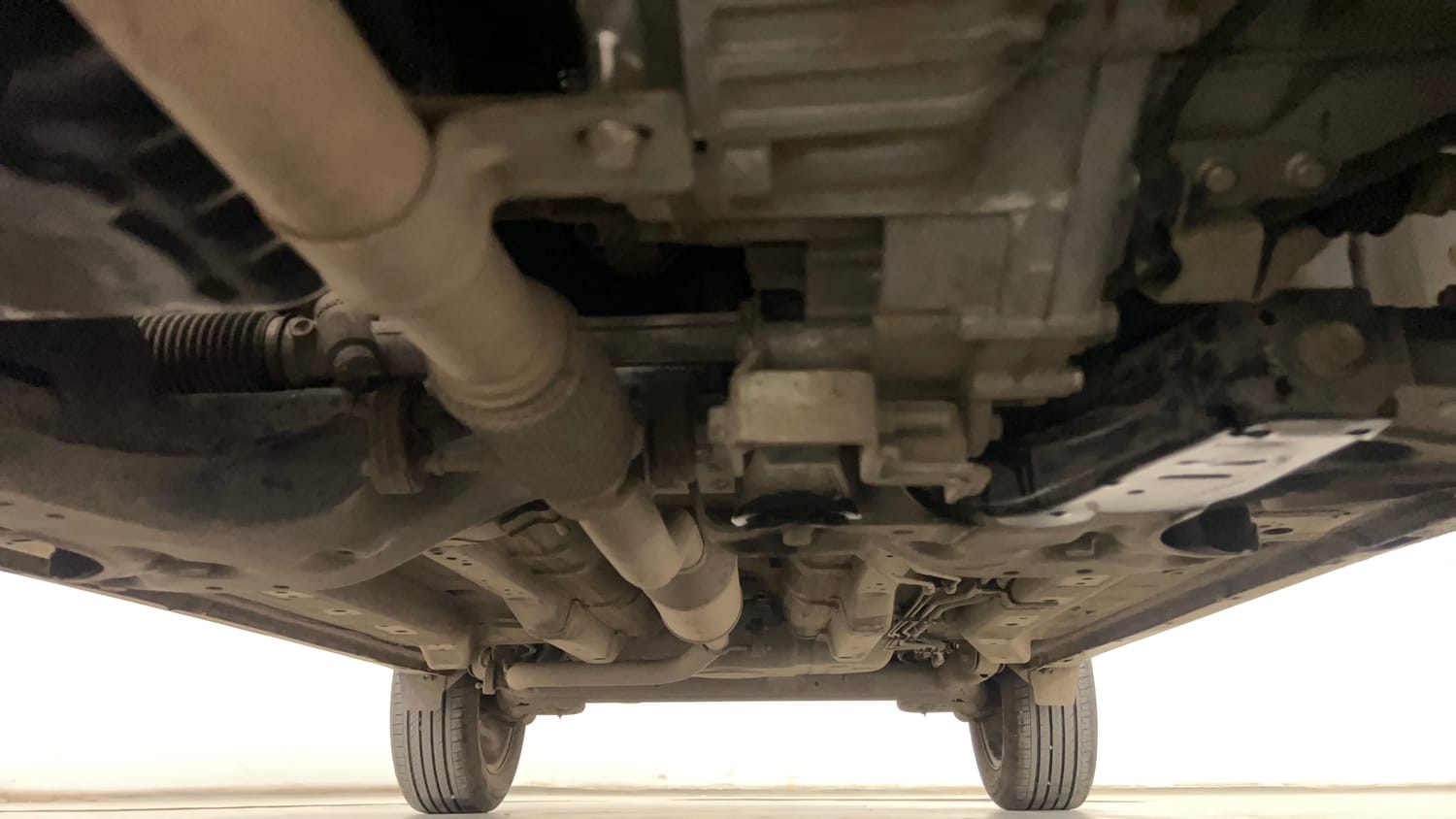 Used 2023 Tata Nexon Creative Plus S 1.2 Revotron Petrol 6AMT Petrol Automatic extra FRONT LEFT UNDERBODY VIEW