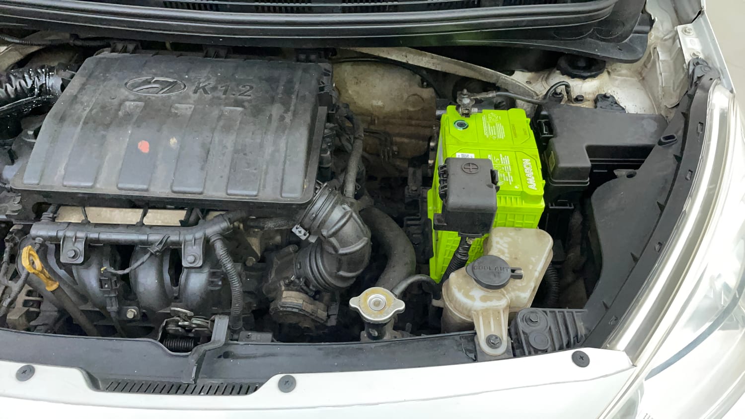 Used 2014 Hyundai Grand i10 Sportz 1.2 Kappa VTVT Petrol Manual engine ENGINE LEFT SIDE VIEW