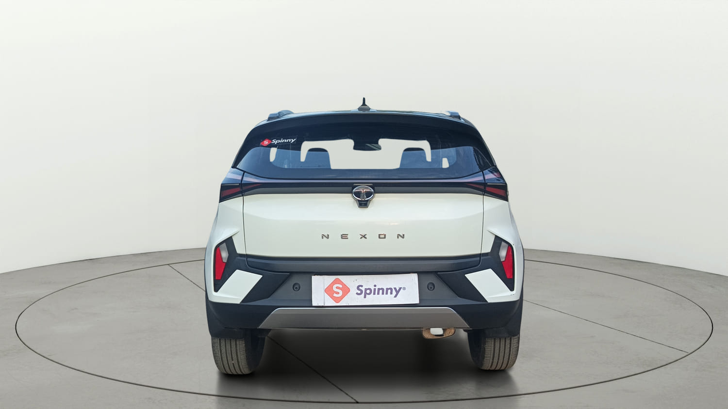 Used 2024 Tata Nexon Fearless Plus S 1.2 Revotron Petrol 7DCA DT Petrol Automatic exterior BACK VIEW