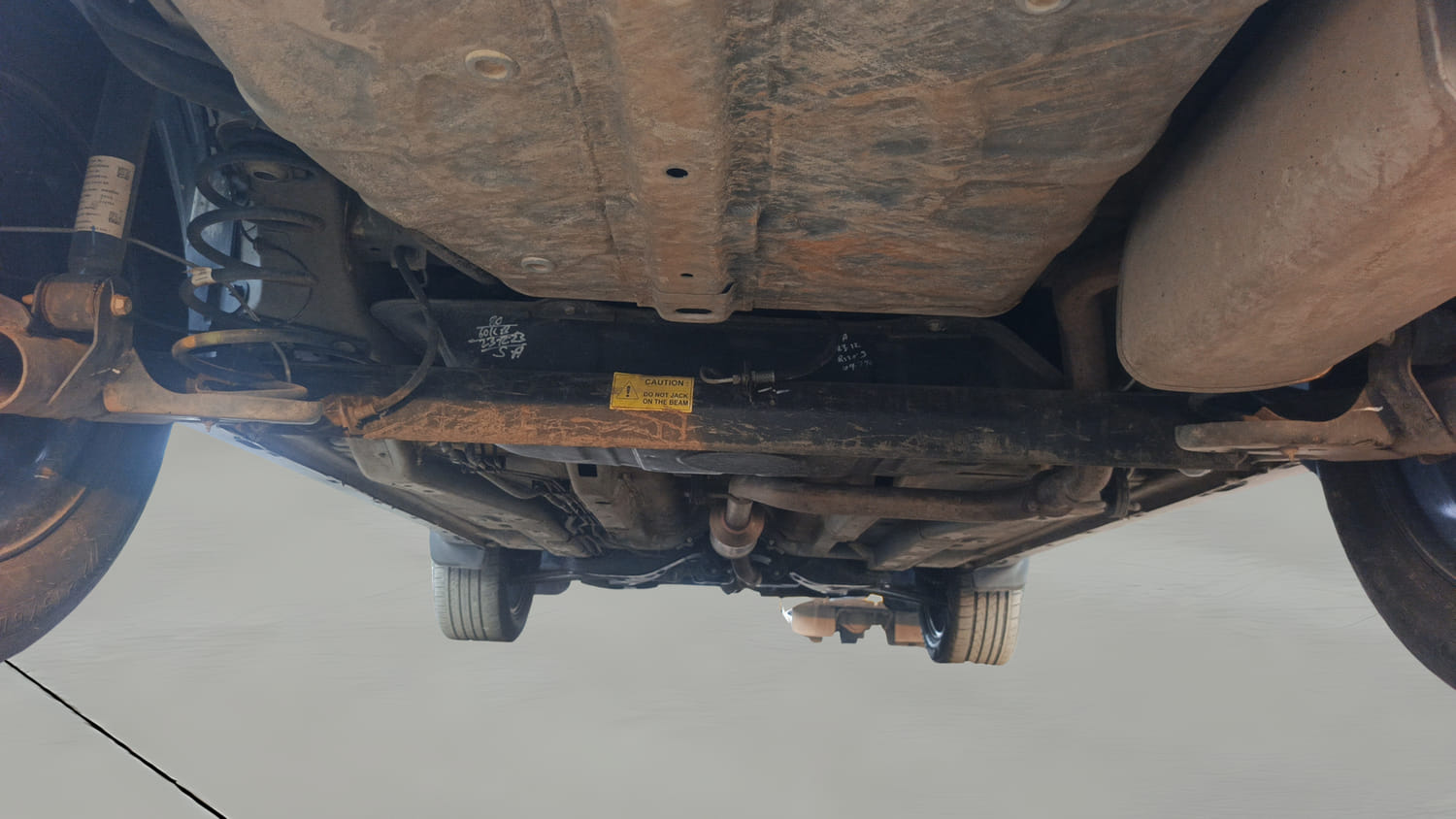 Used 2024 Tata Nexon Fearless Plus S 1.2 Revotron Petrol 7DCA DT Petrol Automatic extra REAR UNDERBODY VIEW (TAKEN FROM REAR)