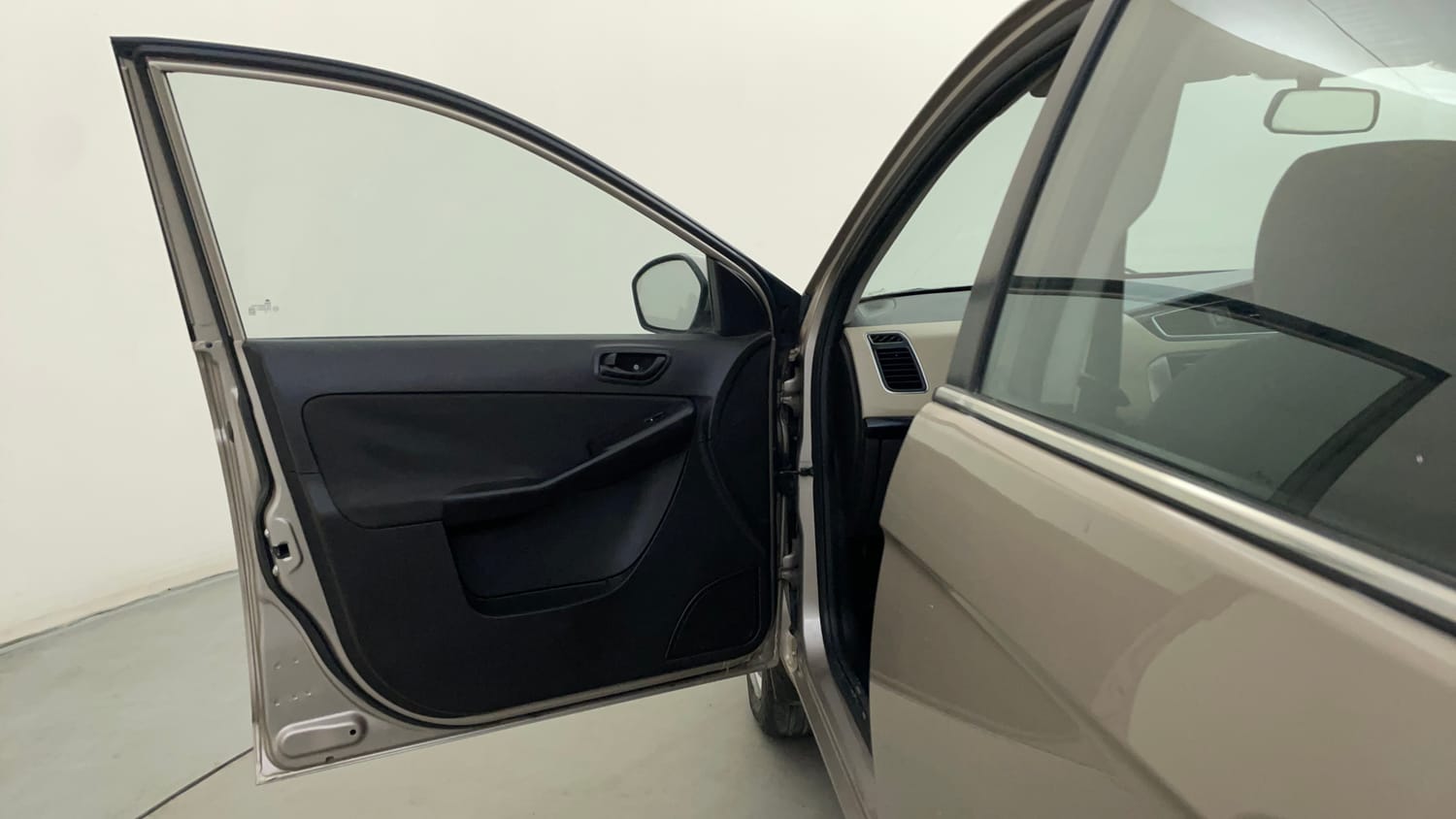 Used 2015 Tata Zest XM Petrol Petrol Manual interior LEFT FRONT DOOR OPEN VIEW