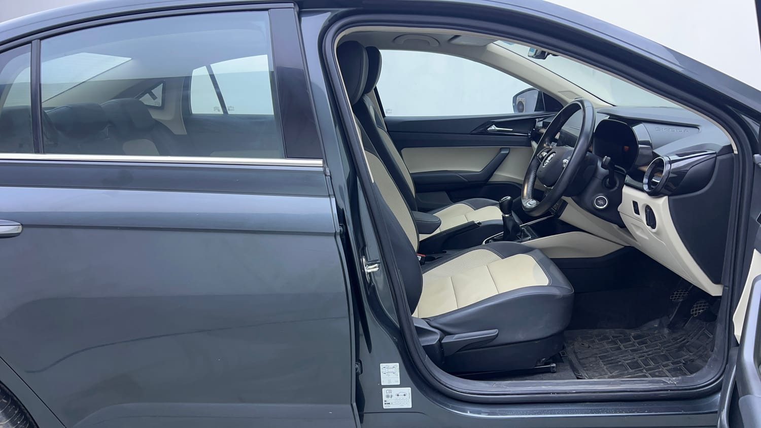 Used 2022 Skoda Slavia Style 1.0L TSI MT Petrol Manual interior RIGHT SIDE FRONT DOOR CABIN VIEW