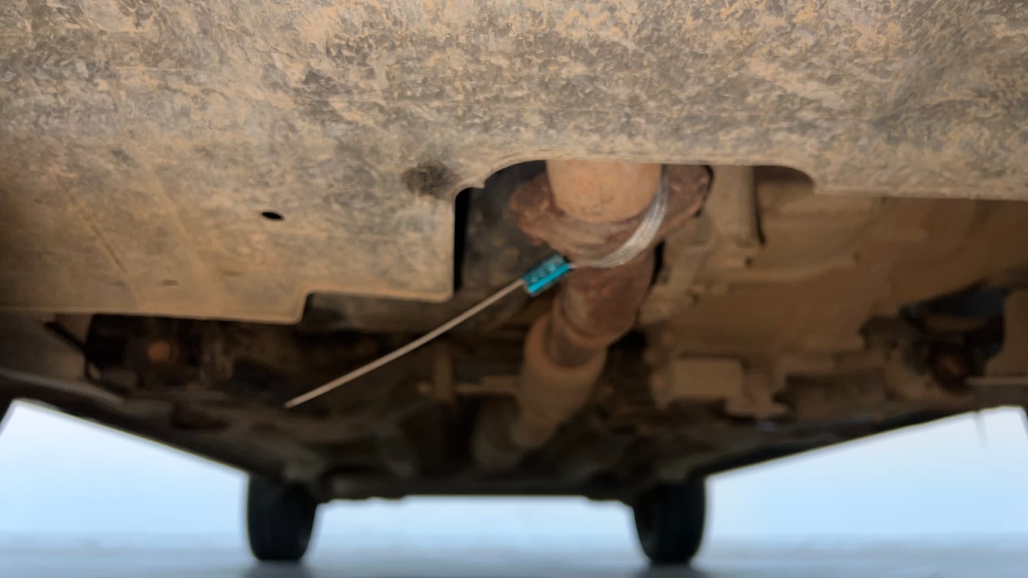 Used 2023 Tata Nexon XM S Petrol + CNG(Outside Fitted) Cng Manual extra FRONT LEFT UNDERBODY VIEW