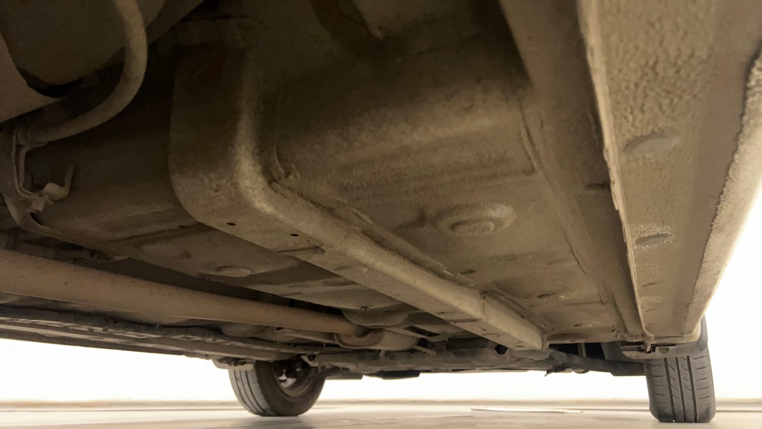 Used 2017 Hyundai Grand i10 Sportz (O) AT 1.2 Kappa VTVT Petrol Automatic extra REAR RIGHT UNDERBODY VIEW
