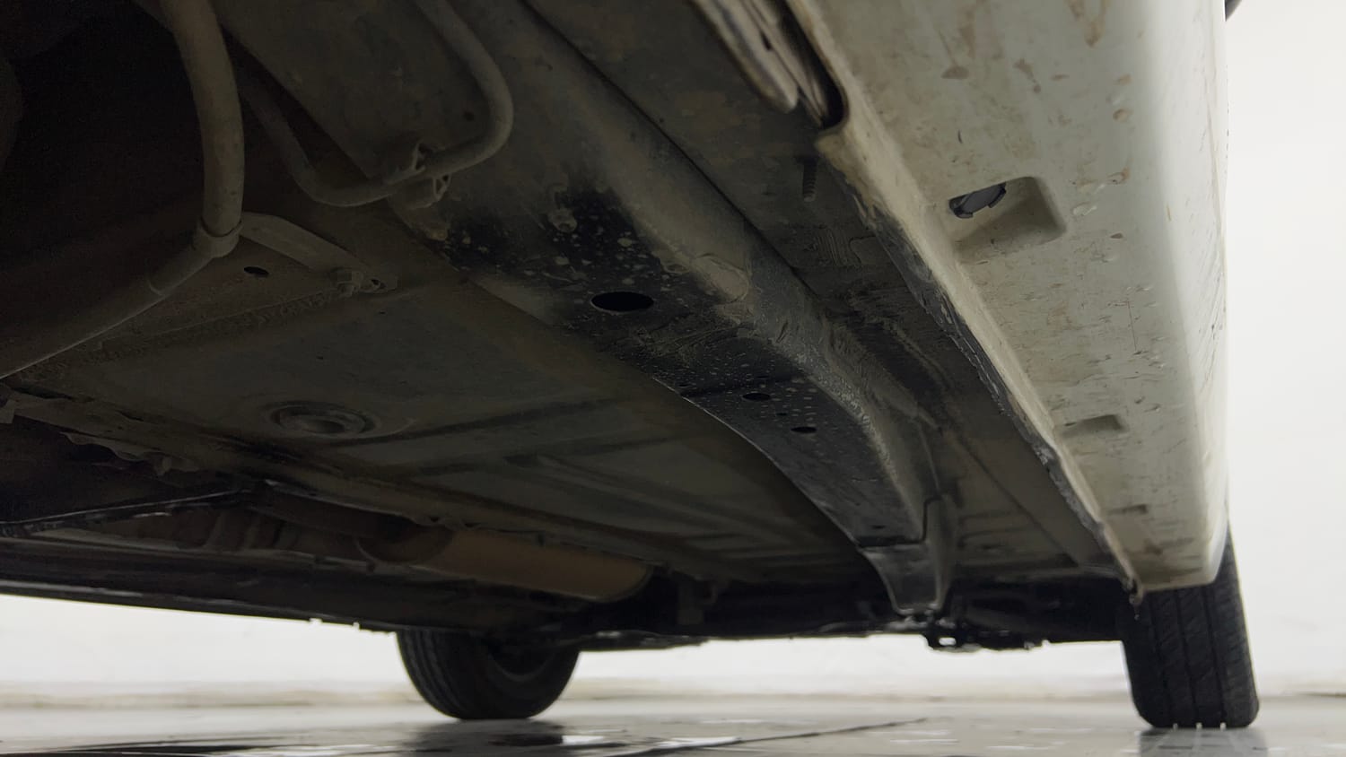 Used 2021 Maruti Suzuki Baleno Delta Petrol+CNG (Outside Fitted) Cng Manual extra REAR RIGHT UNDERBODY VIEW