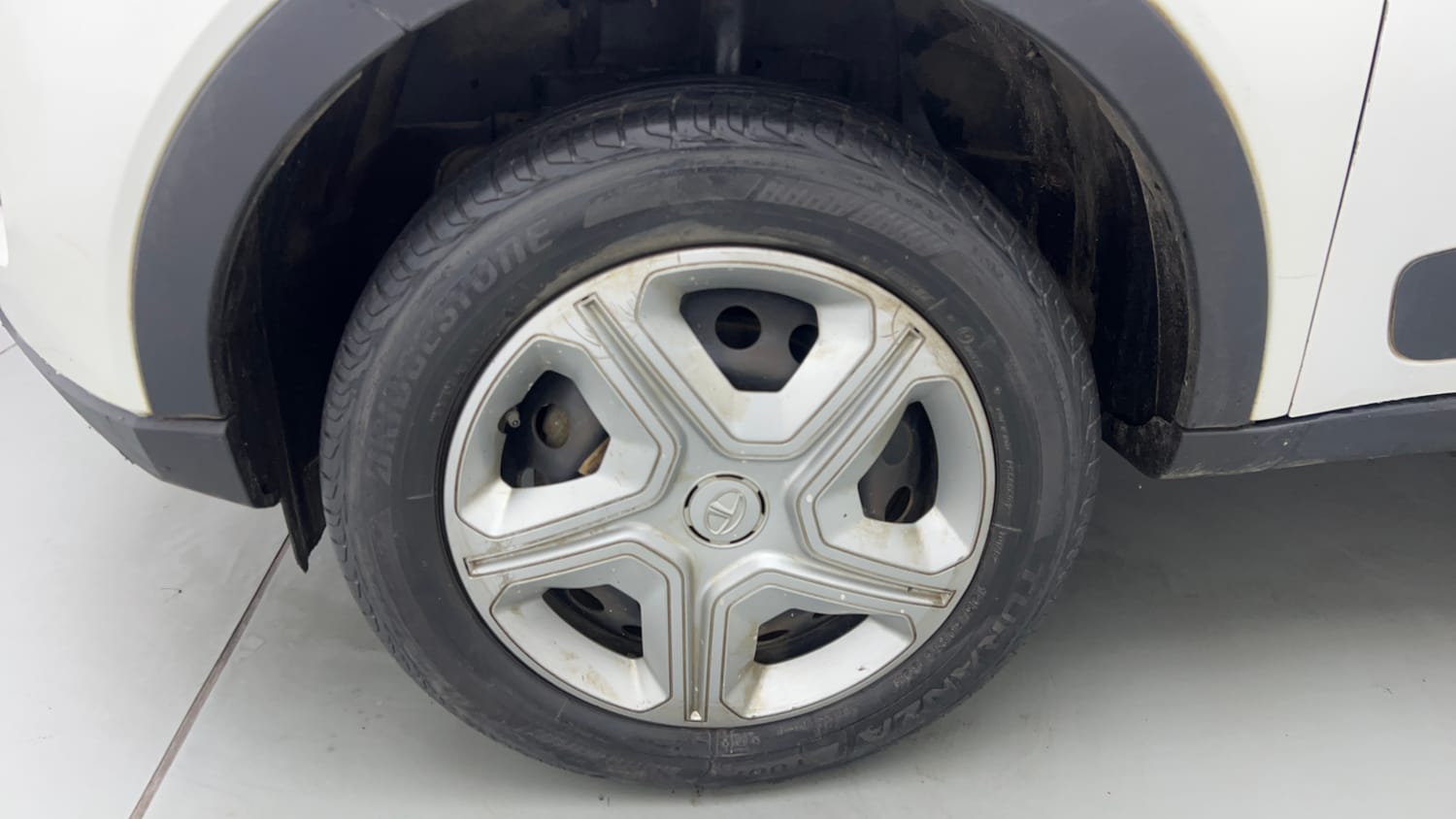 Used 2023 Tata Nexon XM S Petrol + CNG(Outside Fitted) Cng Manual tyres LEFT FRONT TYRE RIM VIEW