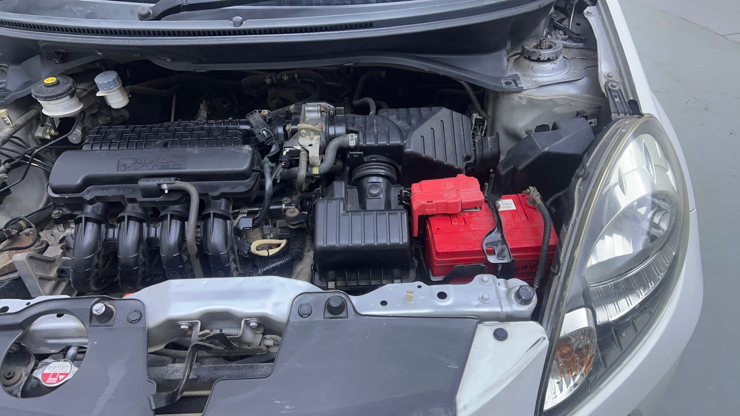 Used 2013 Honda Brio S MT Petrol Manual engine ENGINE LEFT SIDE VIEW