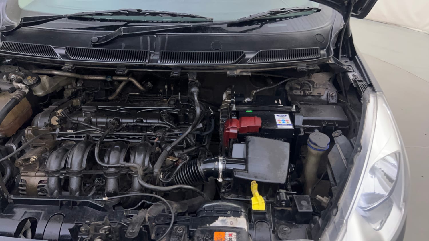 Used 2016 Ford Figo Trend 1.2 Ti-VCT Petrol Manual engine ENGINE LEFT SIDE HINGE & APRON VIEW