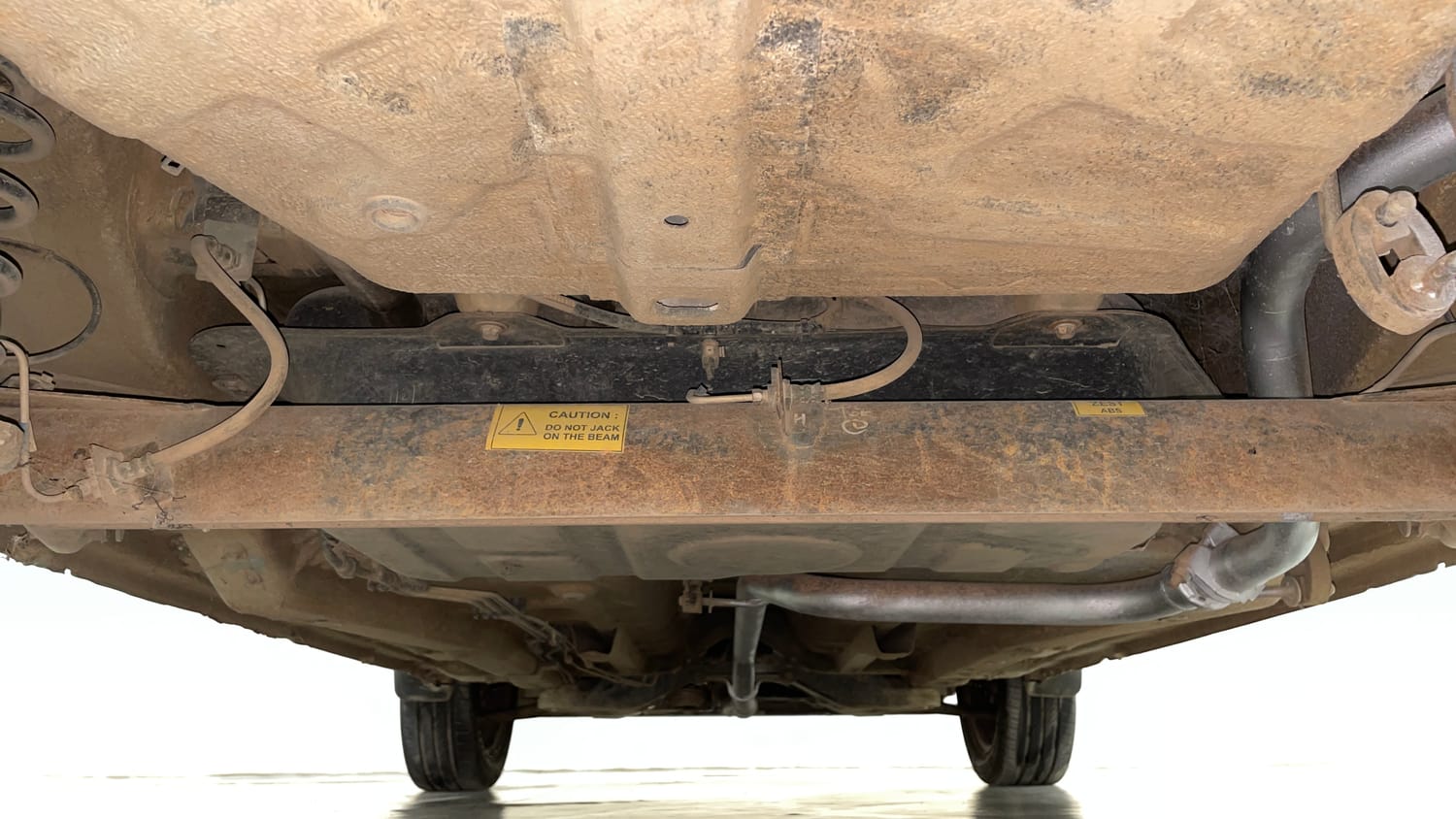 Used 2015 Tata Zest XM Petrol Petrol Manual extra REAR UNDERBODY VIEW (TAKEN FROM REAR)