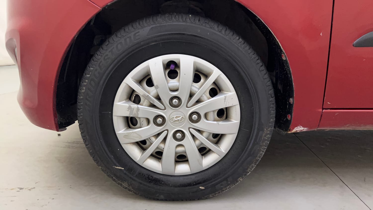 Used 2013 Hyundai i10 Era 1.1 iRDE2 Petrol Manual tyres LEFT FRONT TYRE RIM VIEW