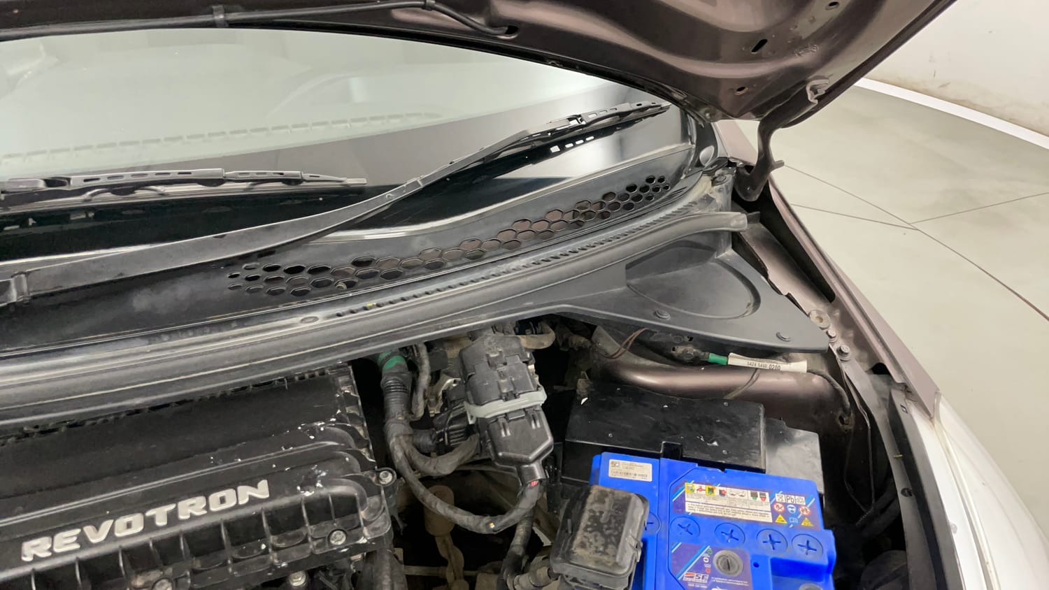 Used 2017 Tata Tiago Revotron XT Petrol Manual engine ENGINE LEFT SIDE HINGE & APRON VIEW