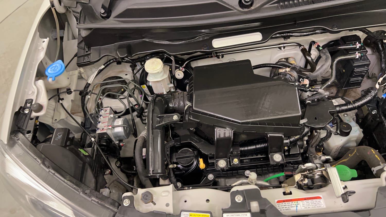 Used 2024 Maruti Suzuki S-Presso VXi (O) AMT Petrol Automatic engine ENGINE RIGHT SIDE VIEW