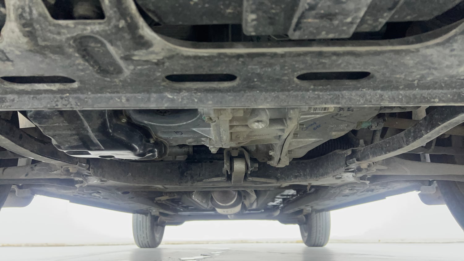 Used 2023 Nissan Magnite XV Premium Turbo Petrol Manual extra FRONT LEFT UNDERBODY VIEW