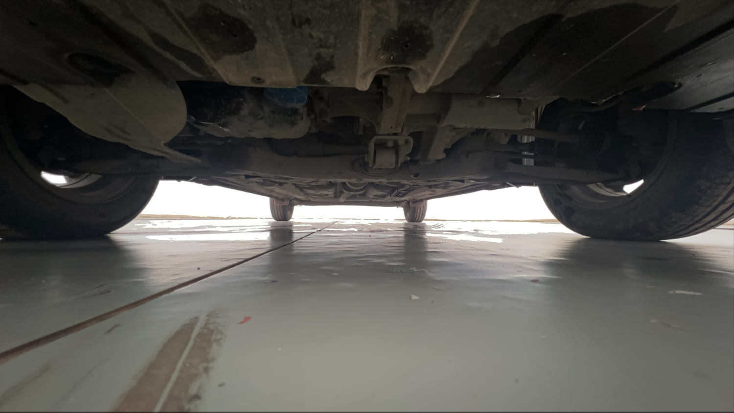 Used 2022 Hyundai Grand i10 Nios Sportz AMT 1.2 Kappa VTVT Petrol Automatic extra FRONT LEFT UNDERBODY VIEW