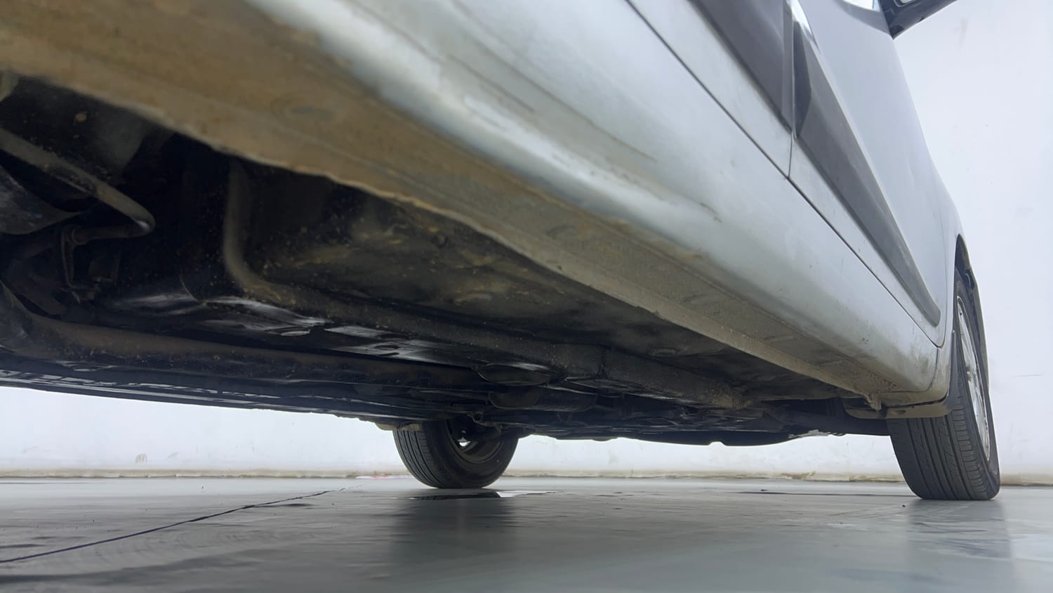 Used 2015 Hyundai Xcent S 1.2 (O) Petrol Manual extra REAR RIGHT UNDERBODY VIEW