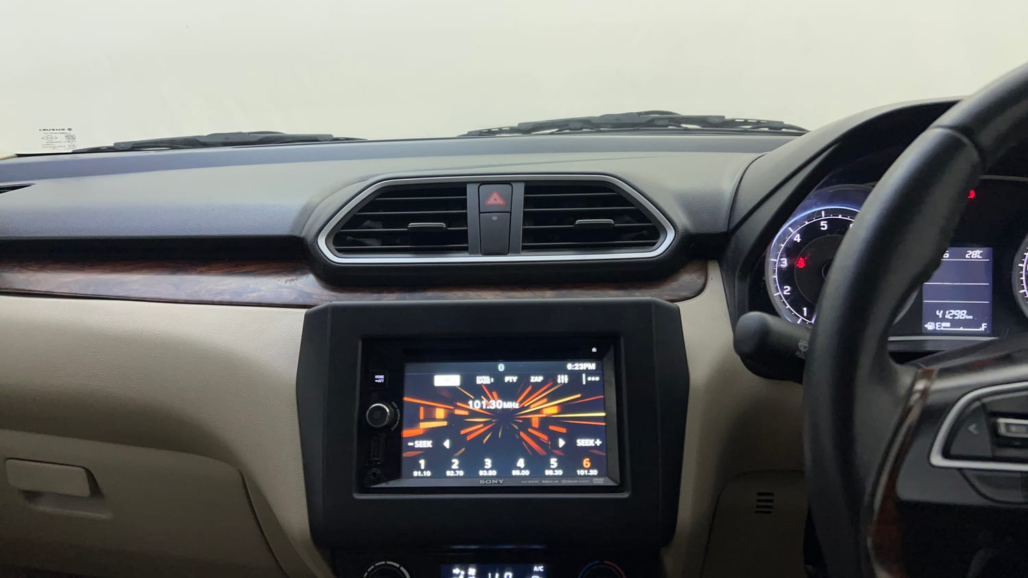 Used 2018 Maruti Suzuki Dzire ZXi Petrol Manual top_features Integrated (in-dash) music system