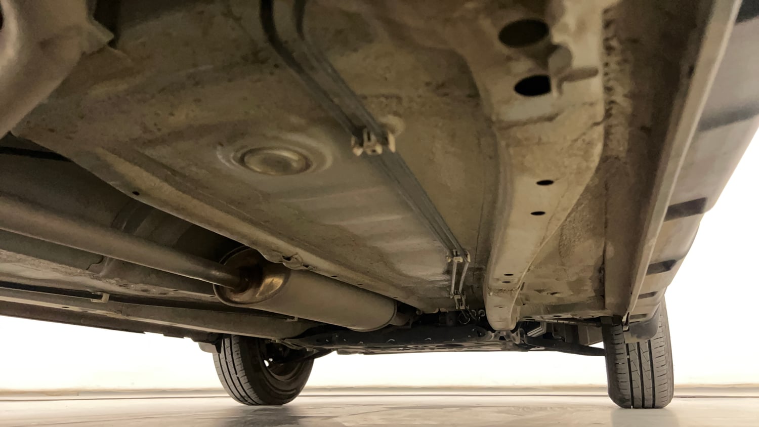 Used 2024 Maruti Suzuki S-Presso VXi (O) AMT Petrol Automatic extra REAR RIGHT UNDERBODY VIEW