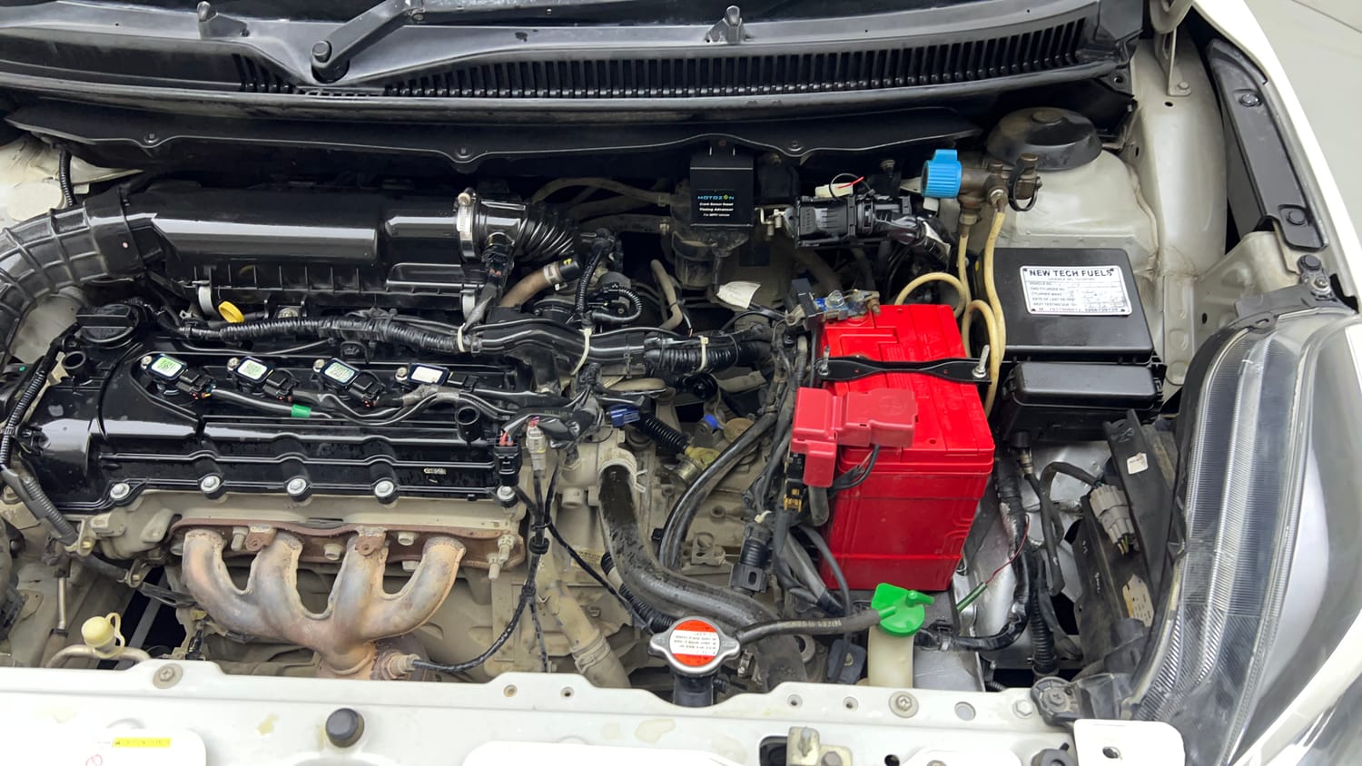 Used 2021 Maruti Suzuki Baleno Delta Petrol+CNG (Outside Fitted) Cng Manual engine ENGINE LEFT SIDE VIEW