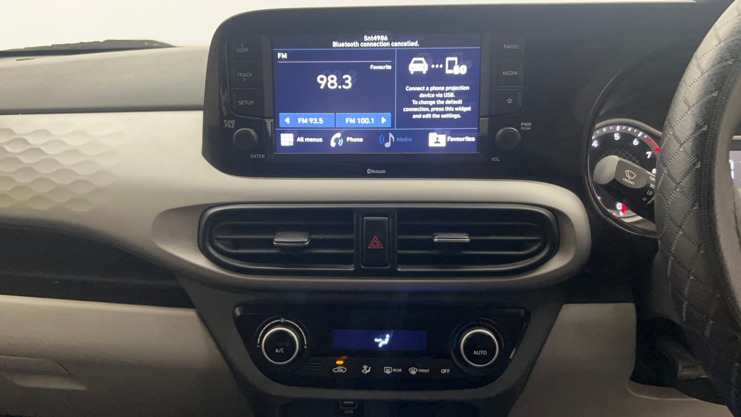 Used 2022 Hyundai Grand i10 Nios Sportz AMT 1.2 Kappa VTVT Petrol Automatic top_features Integrated (in-dash) music system