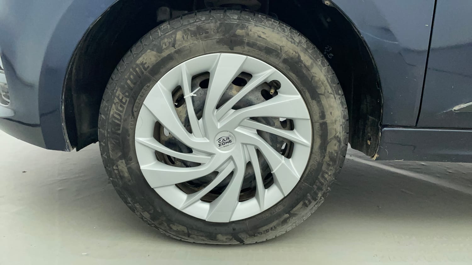 Used 2023 Tata Tigor XZ CNG Cng Manual tyres LEFT FRONT TYRE RIM VIEW