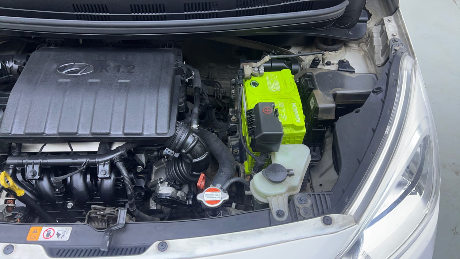 Used 2017 Hyundai Grand i10 Sportz (O) AT 1.2 Kappa VTVT Petrol Automatic engine ENGINE LEFT SIDE VIEW