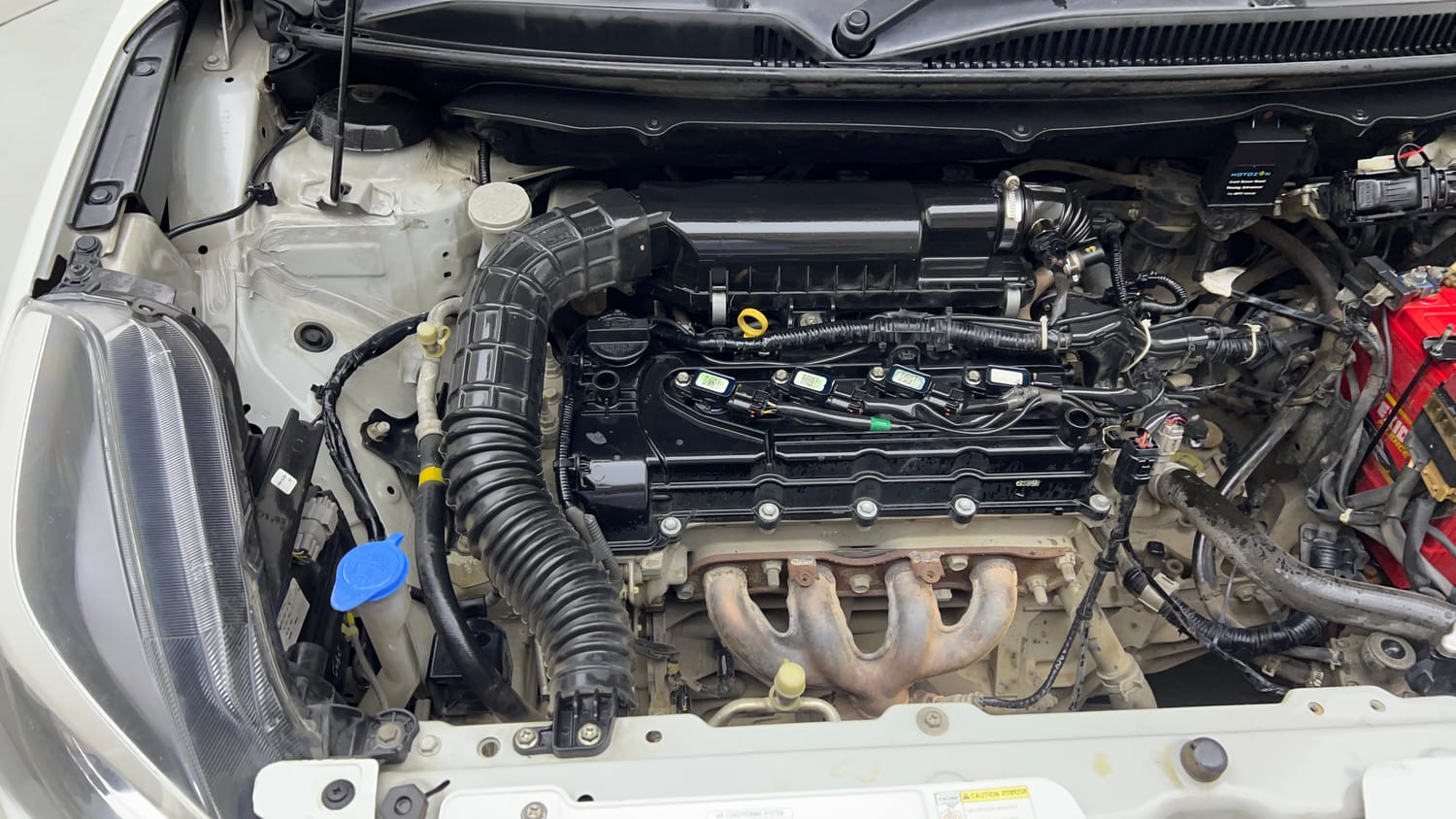 Used 2021 Maruti Suzuki Baleno Delta Petrol+CNG (Outside Fitted) Cng Manual engine ENGINE RIGHT SIDE VIEW