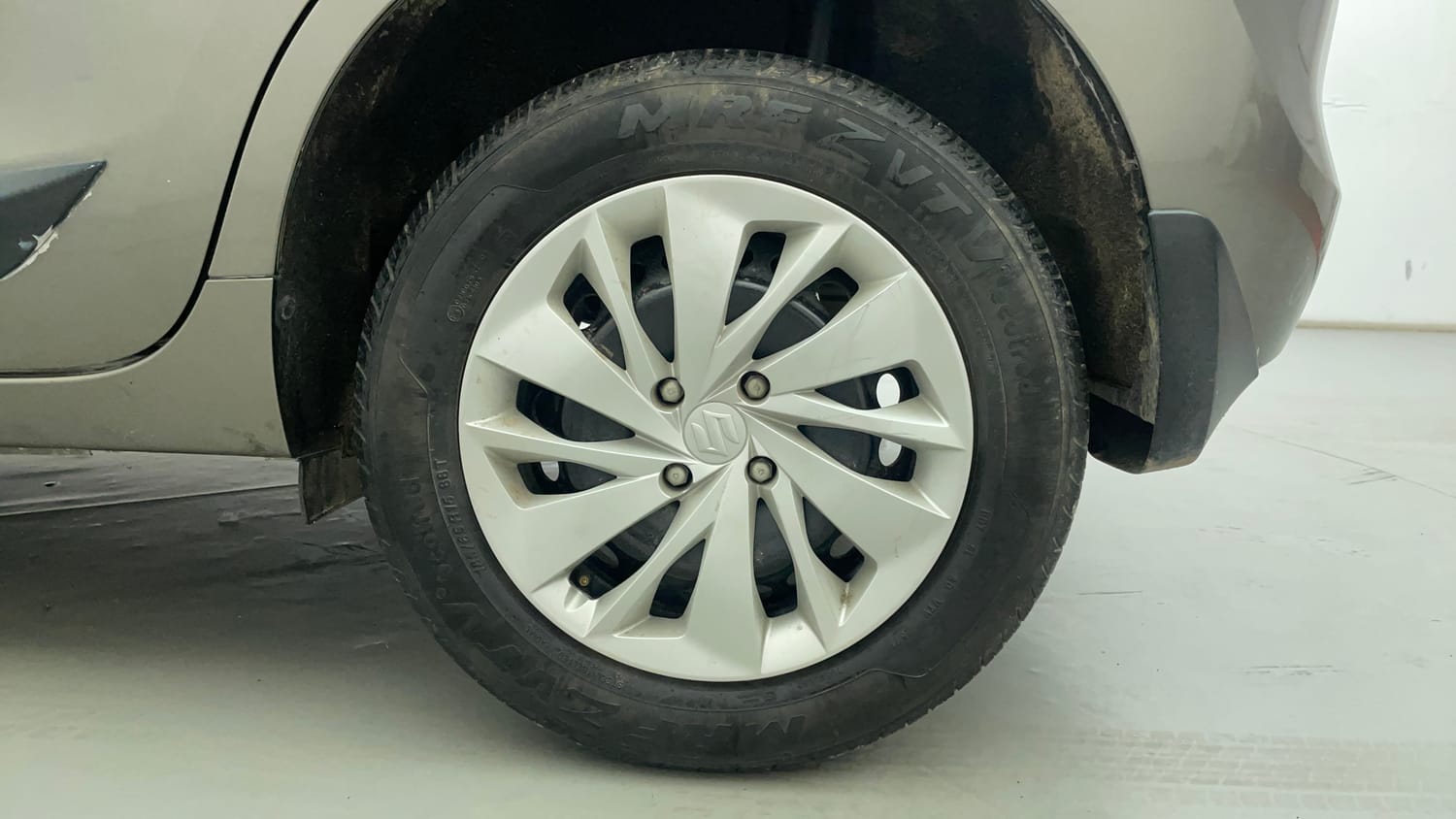 Used 2021 Maruti Suzuki Baleno Delta Petrol Manual tyres LEFT REAR TYRE RIM VIEW