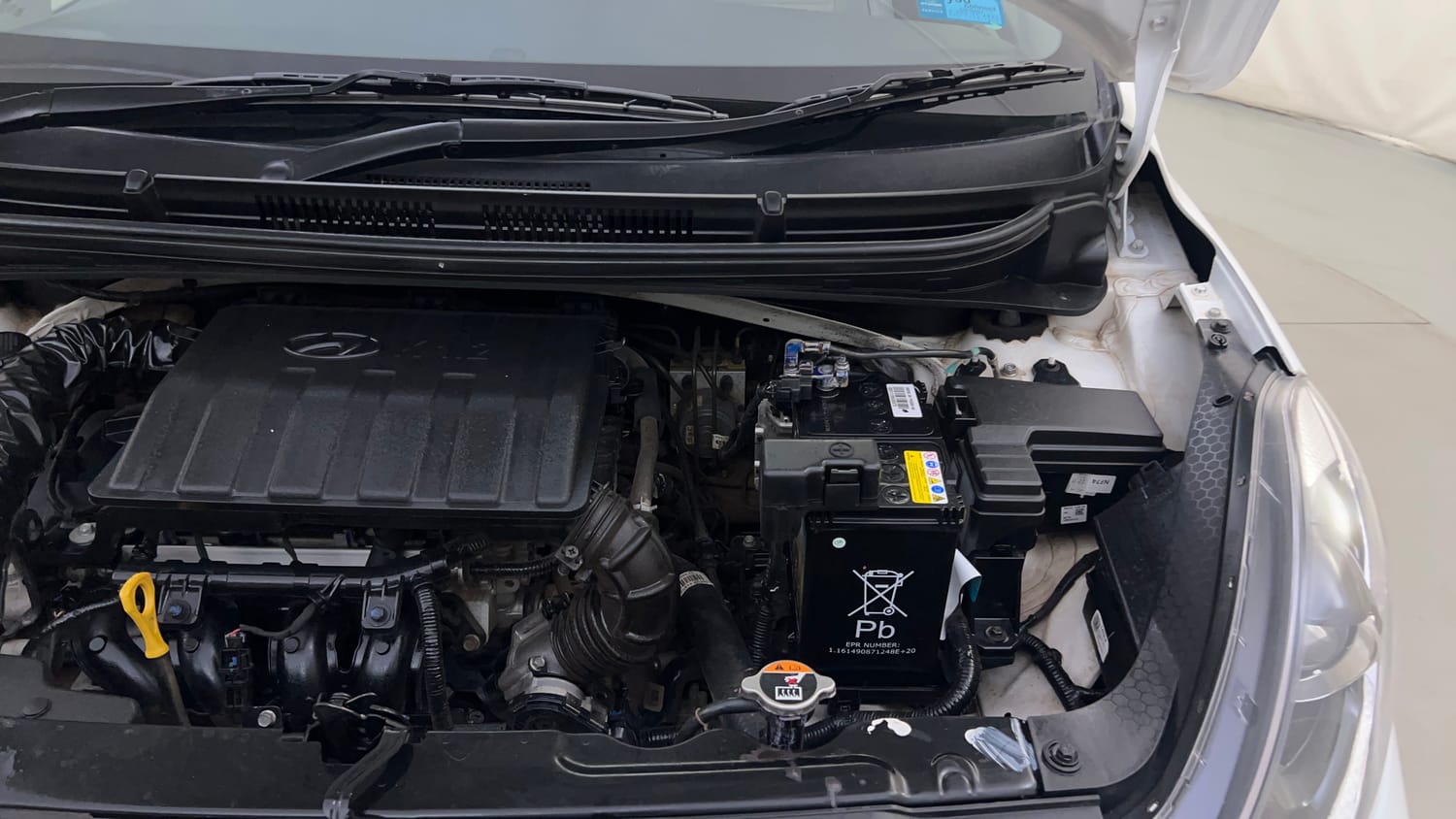 Used 2023 Hyundai Grand i10 Nios Sportz 1.2 Kappa VTVT Petrol Manual engine ENGINE LEFT SIDE HINGE & APRON VIEW