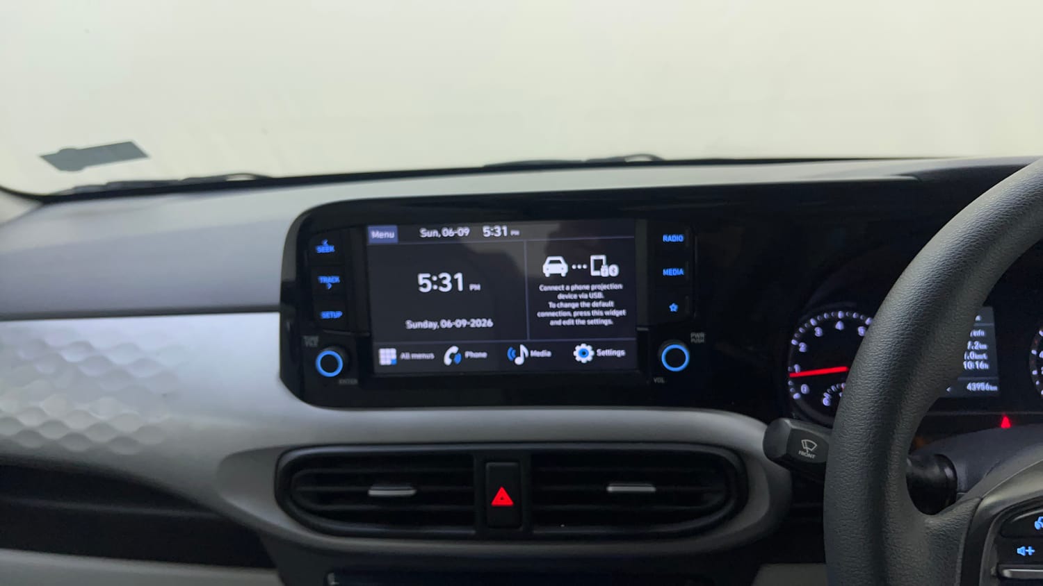 Used 2023 Hyundai Grand i10 Nios Sportz 1.2 Kappa VTVT Petrol Manual top_features Integrated (in-dash) music system