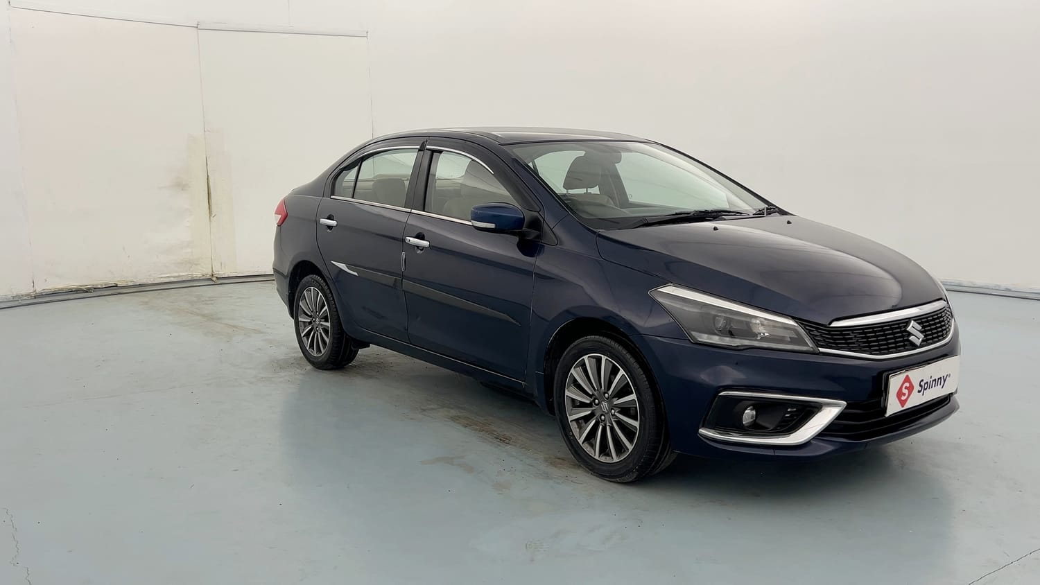 Used 2023 Maruti Suzuki Ciaz Alpha 1.5 Petrol Manual exterior RIGHT FRONT CORNER VIEW