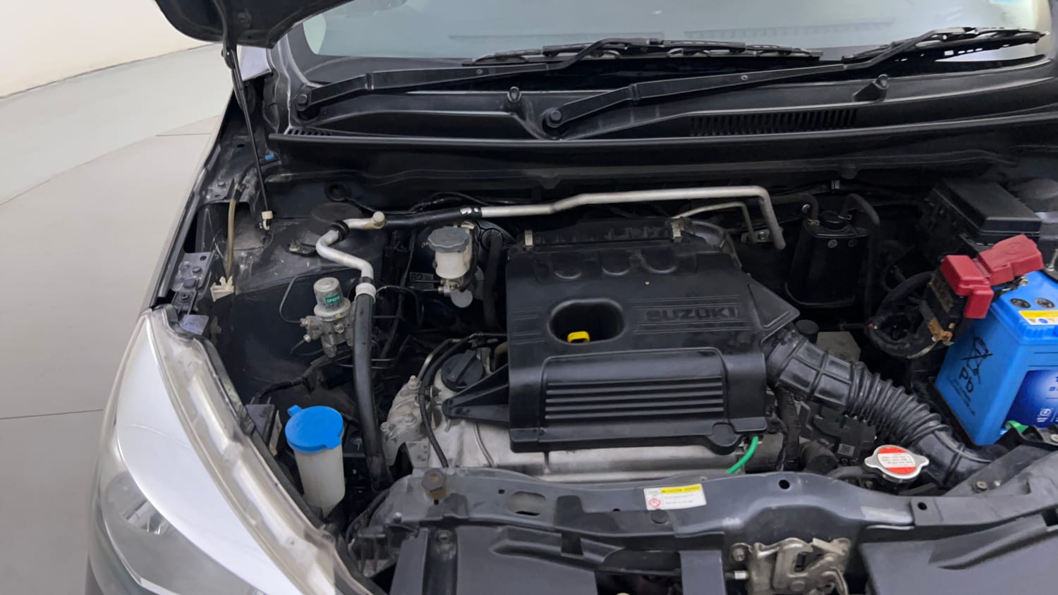 Used 2016 Maruti Suzuki Celerio ZXi AMT Petrol Automatic engine ENGINE RIGHT SIDE HINGE & APRON VIEW
