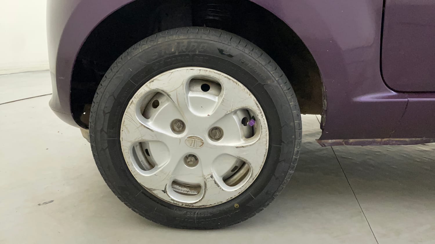 Used 2015 Tata Nano Twist XTA Petrol Automatic tyres LEFT FRONT TYRE RIM VIEW